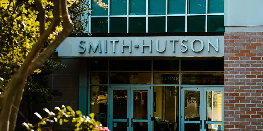 The Smith-Hutson building, viewed from near a tree.