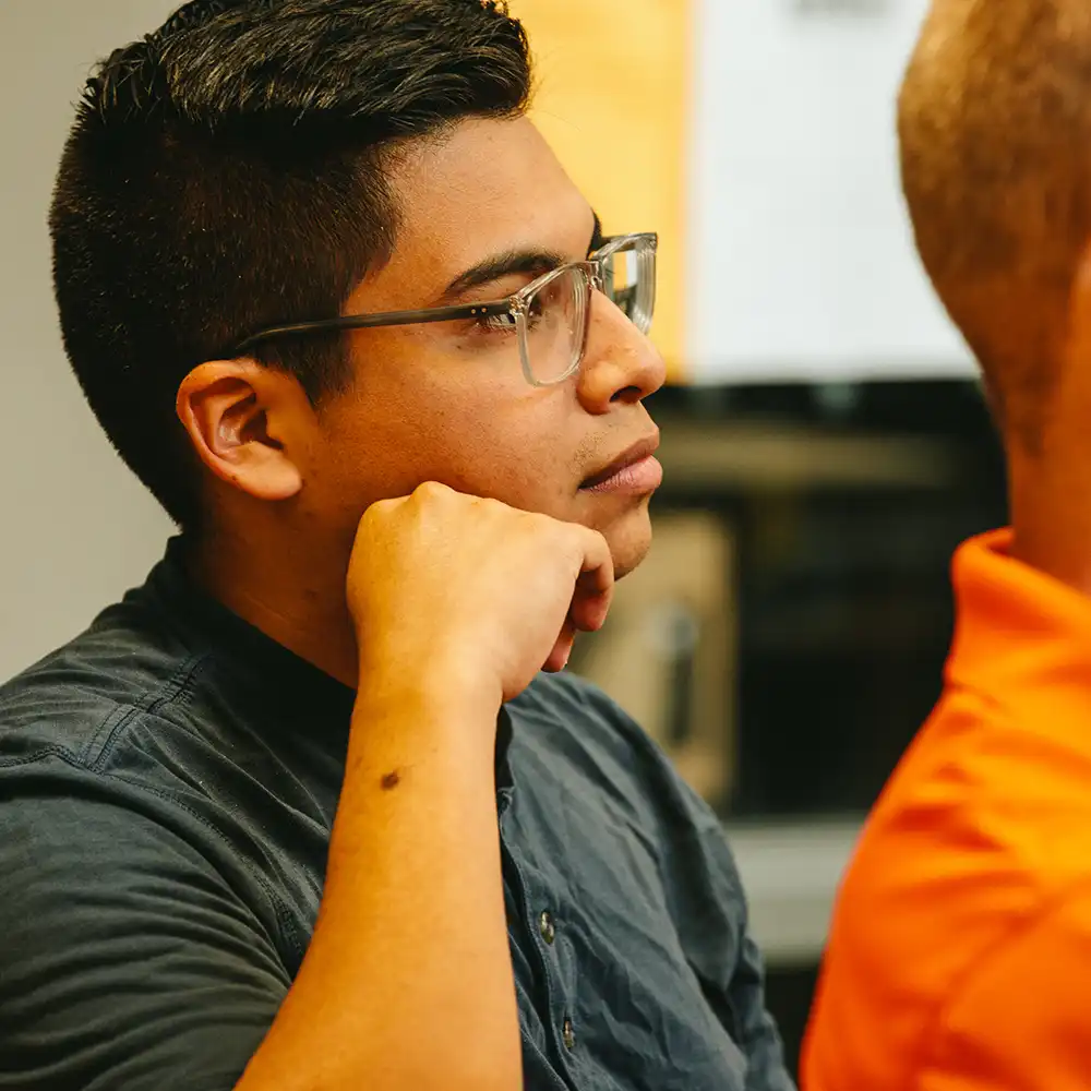   COBA student engages during lecture.