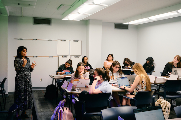 CJ and Criminology Professor teaching classroom full of students.