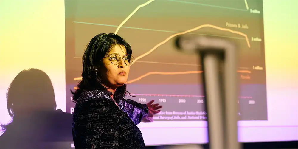 Students in a classroom listening to a lecture.