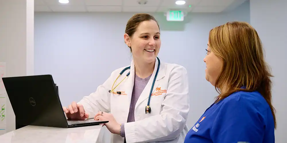 Dr. Powell with staff at SHSU Physicians