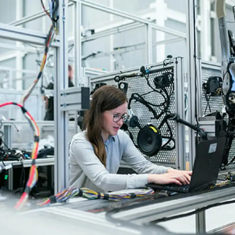 Student using laptop in laboratory