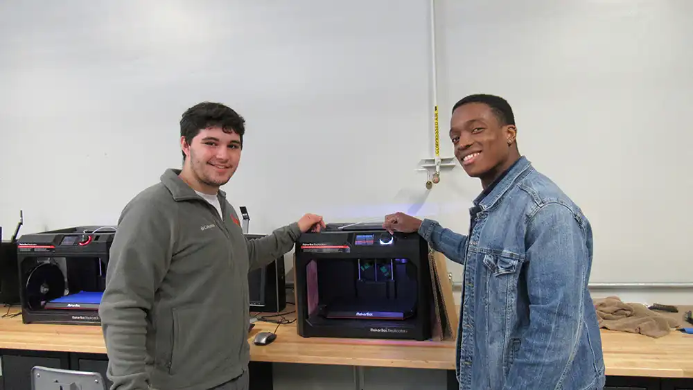two students in the innovations lab