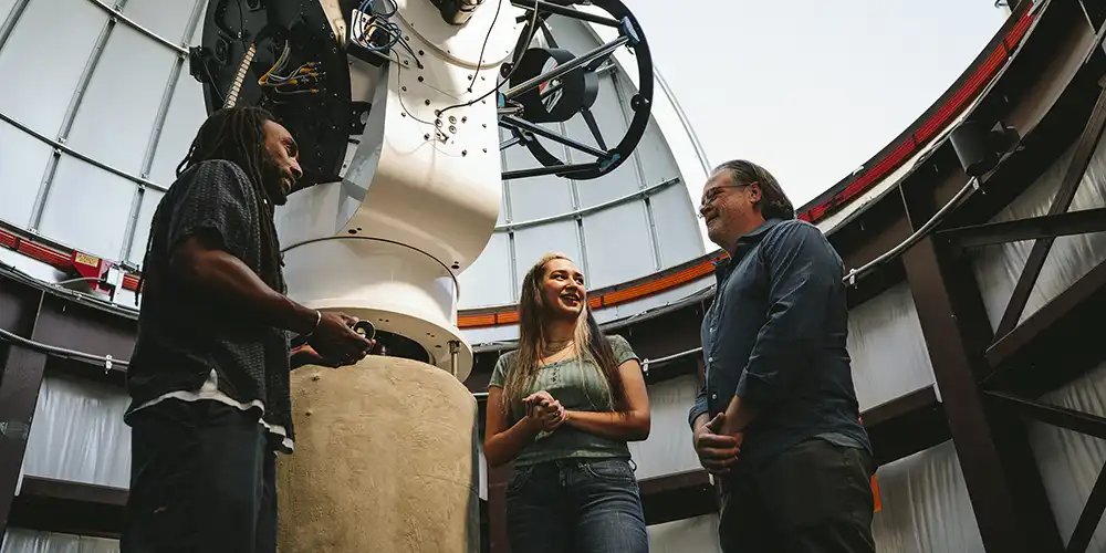 Students and professor at the Dominey Observatory 