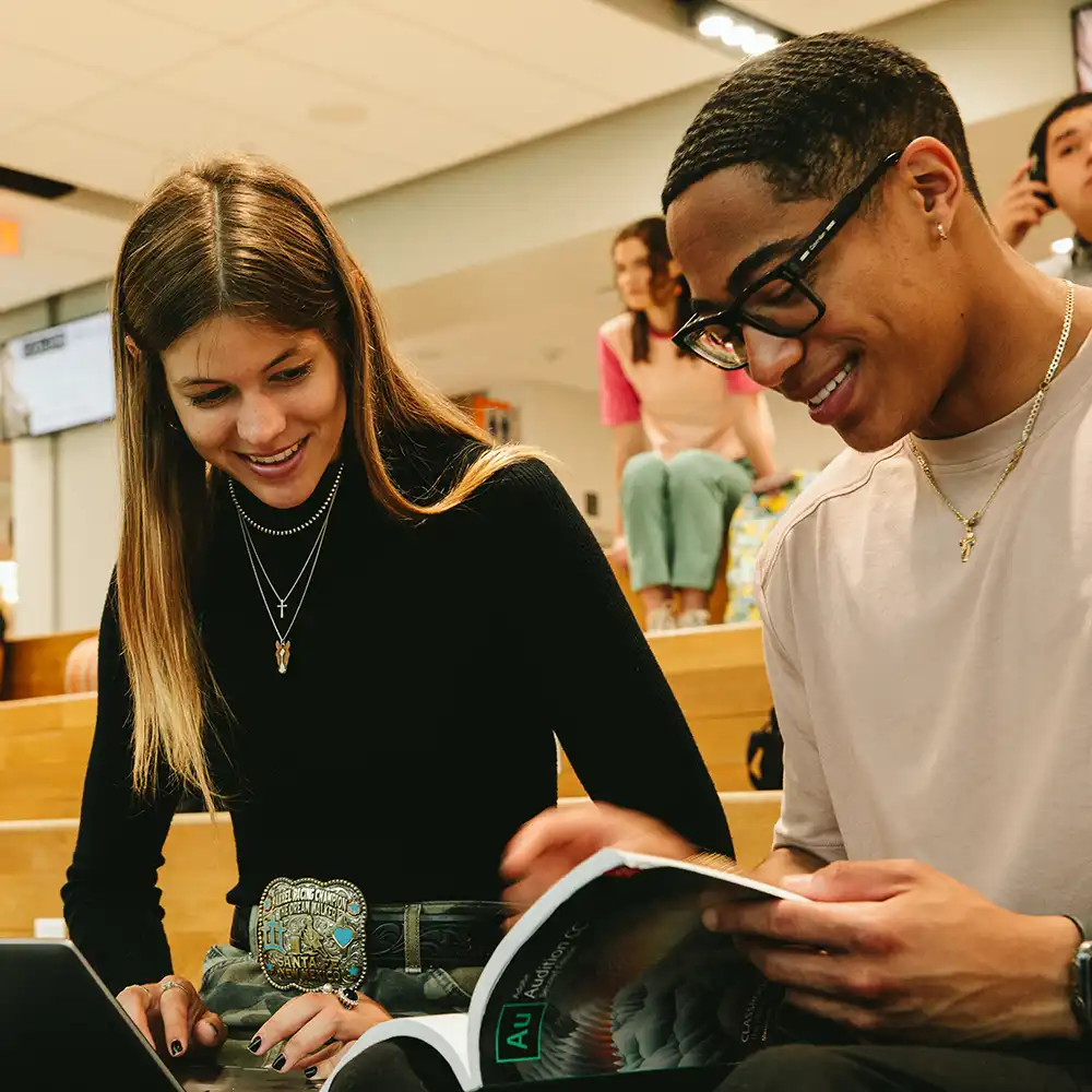 SHSU students in conversation with the Dean from the College of Humanities and Social Sciences.