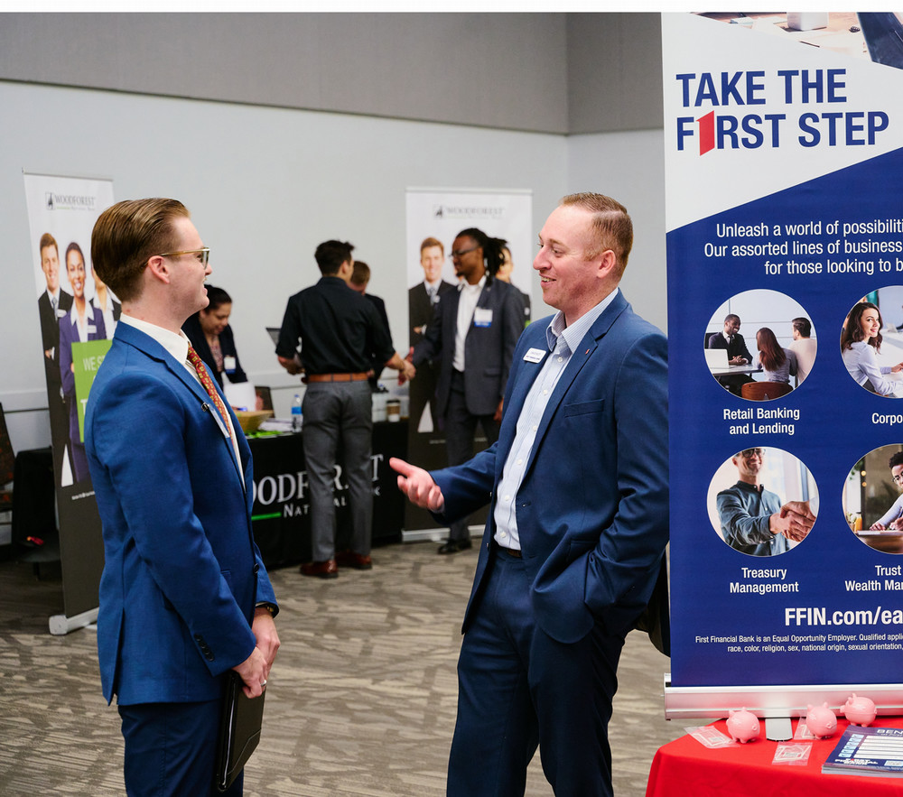 Student speaking with an employer