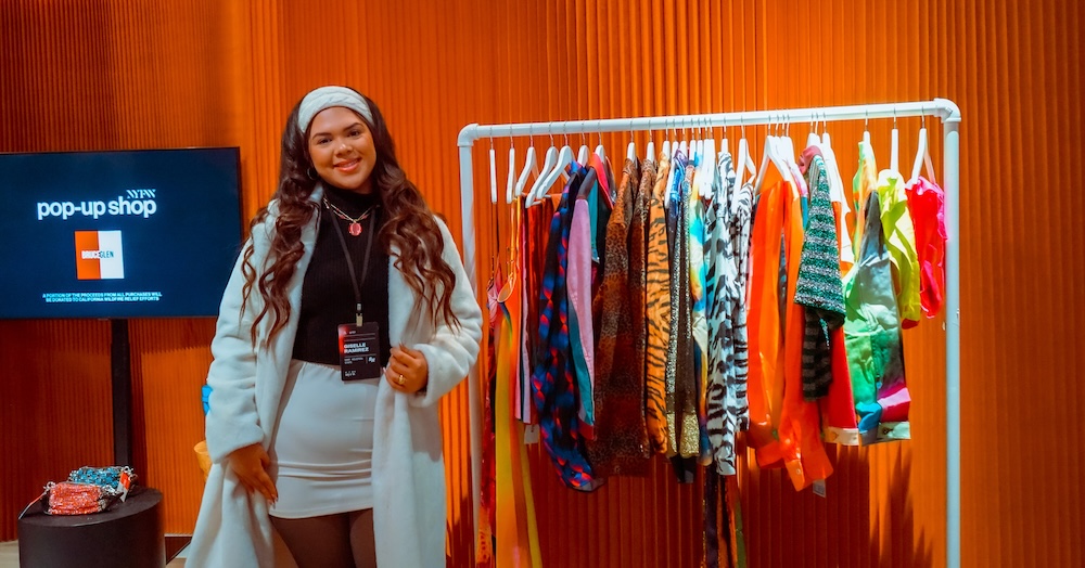 Man in suit talking to another man