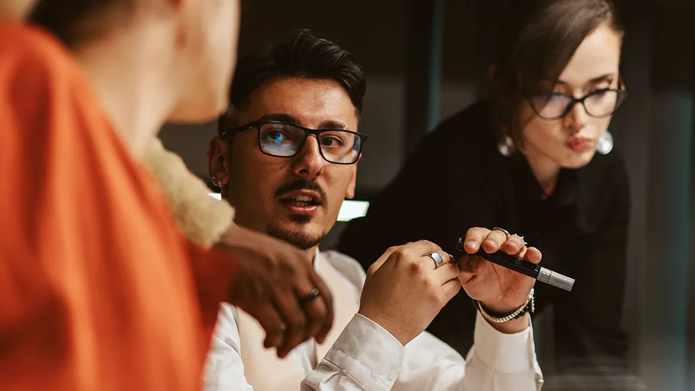 Students discuss financial aid options with counselors.