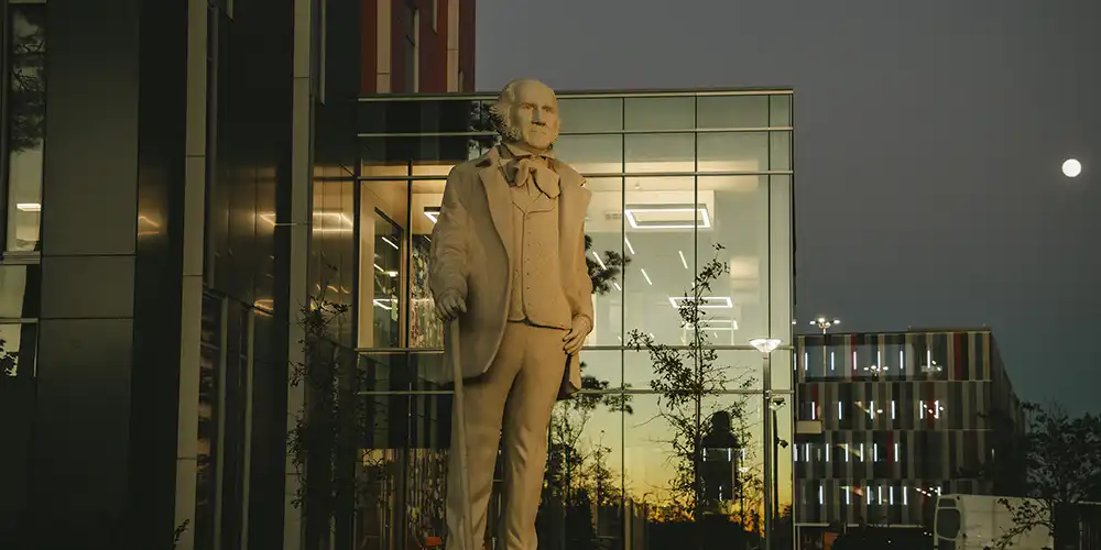 Sam Houston statue in front of the COM building