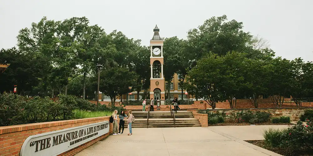 pizza being served in dining hall