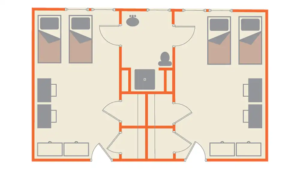 Floor plan layout of an Estill Hall suite at SHSU, showing two double-occupancy bedrooms. Each room contains two beds, desks, and storage. A shared bathroom in the center includes two sinks, a toilet, and a shower. Entrances are located at the bottom of the image.