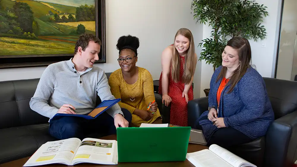 Four students working together.