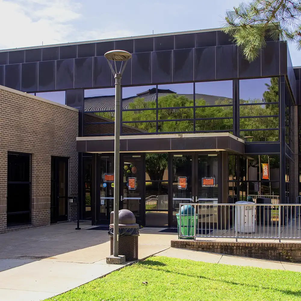 Front of the recreational center building during the daylight.