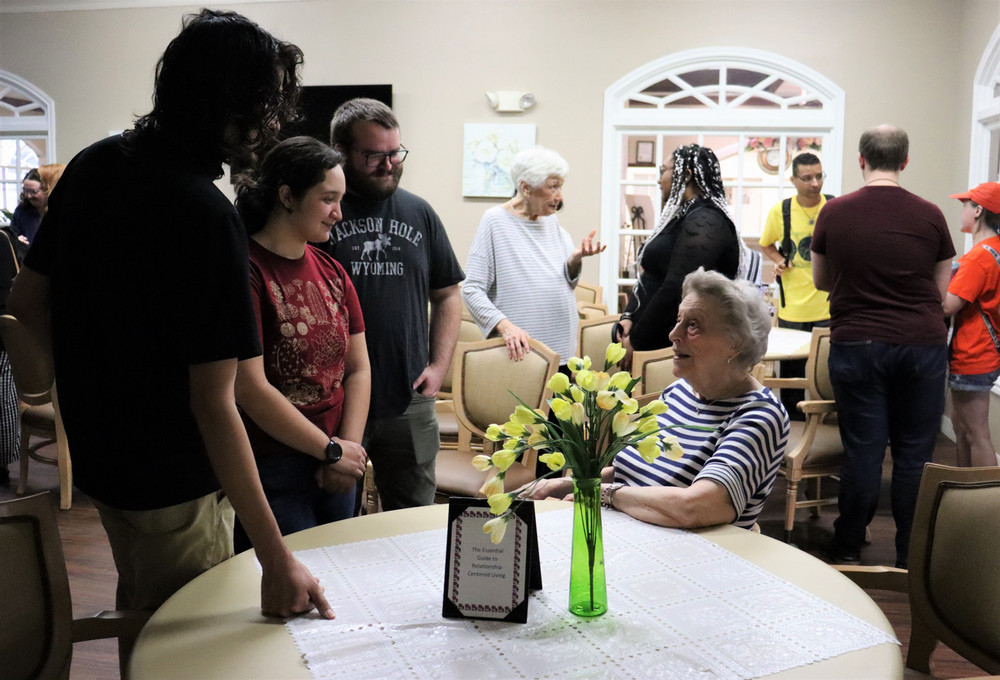 Students visit with Carriage Inn resident