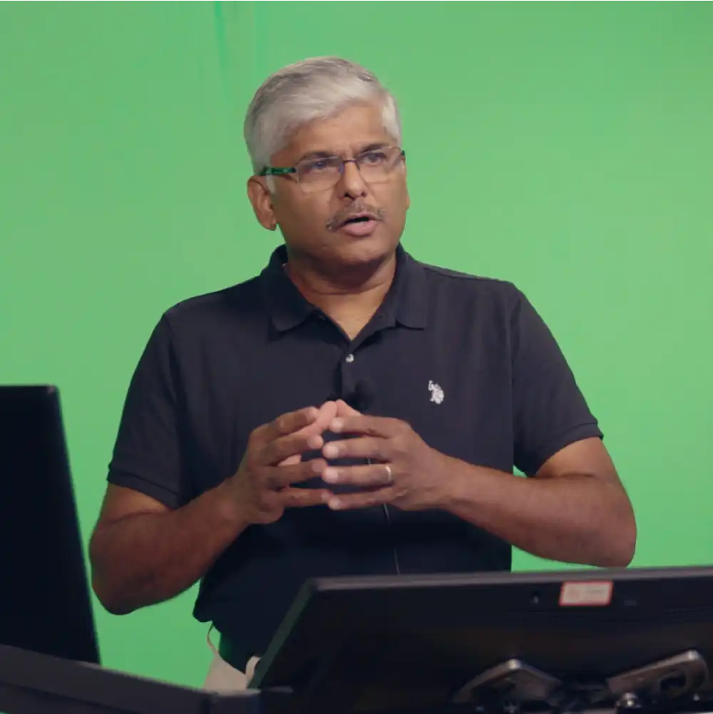 SHSU Professor lecturing in front of a green screen