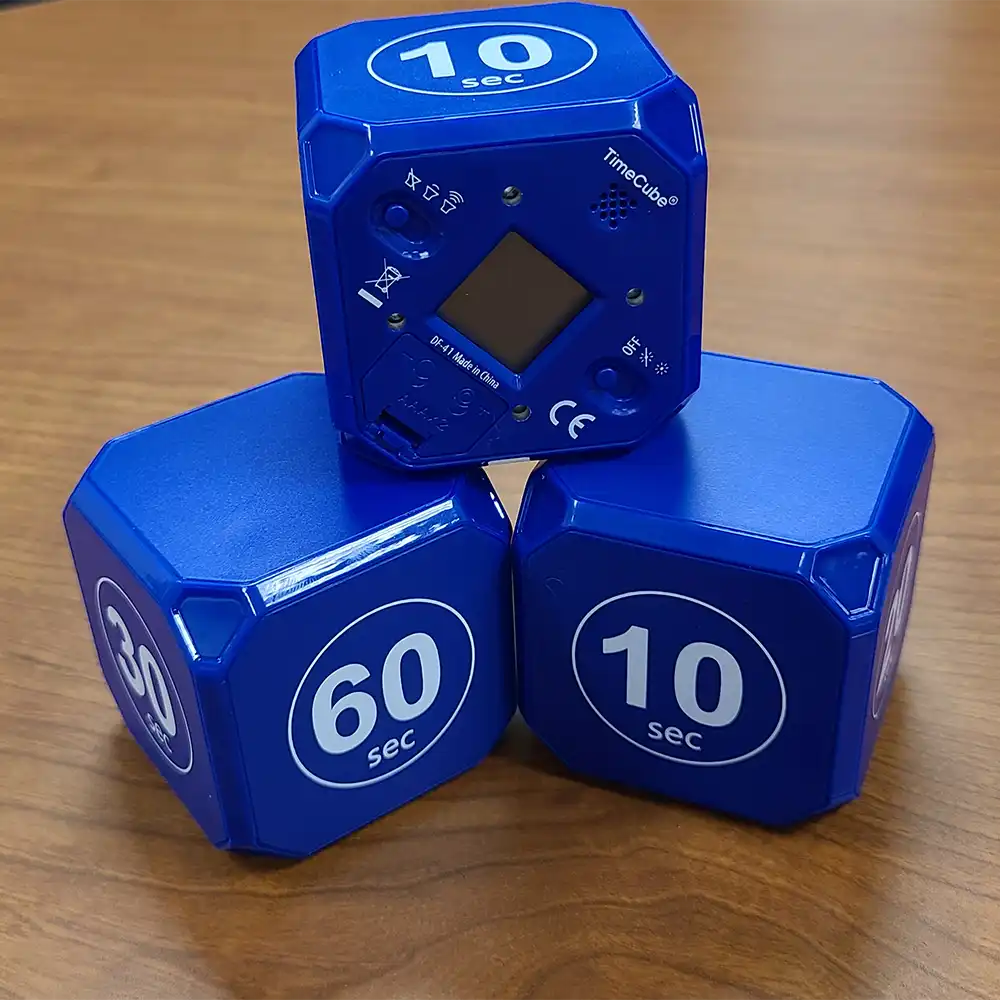 This is a photo of 3 cube timers stacked to show several sides.