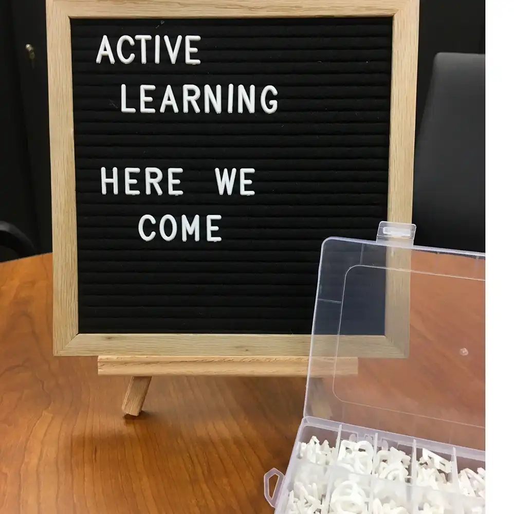 Photo of letter board on easel and letters.