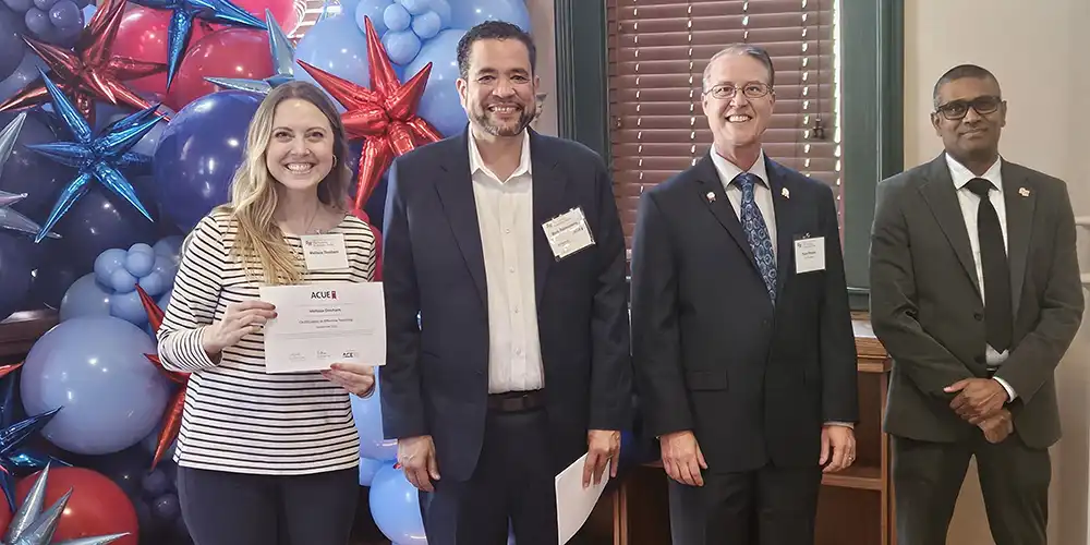 A 2025 ACUE Pinning Ceremony recipient.